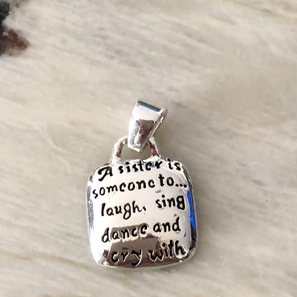 Petite “sister” charm